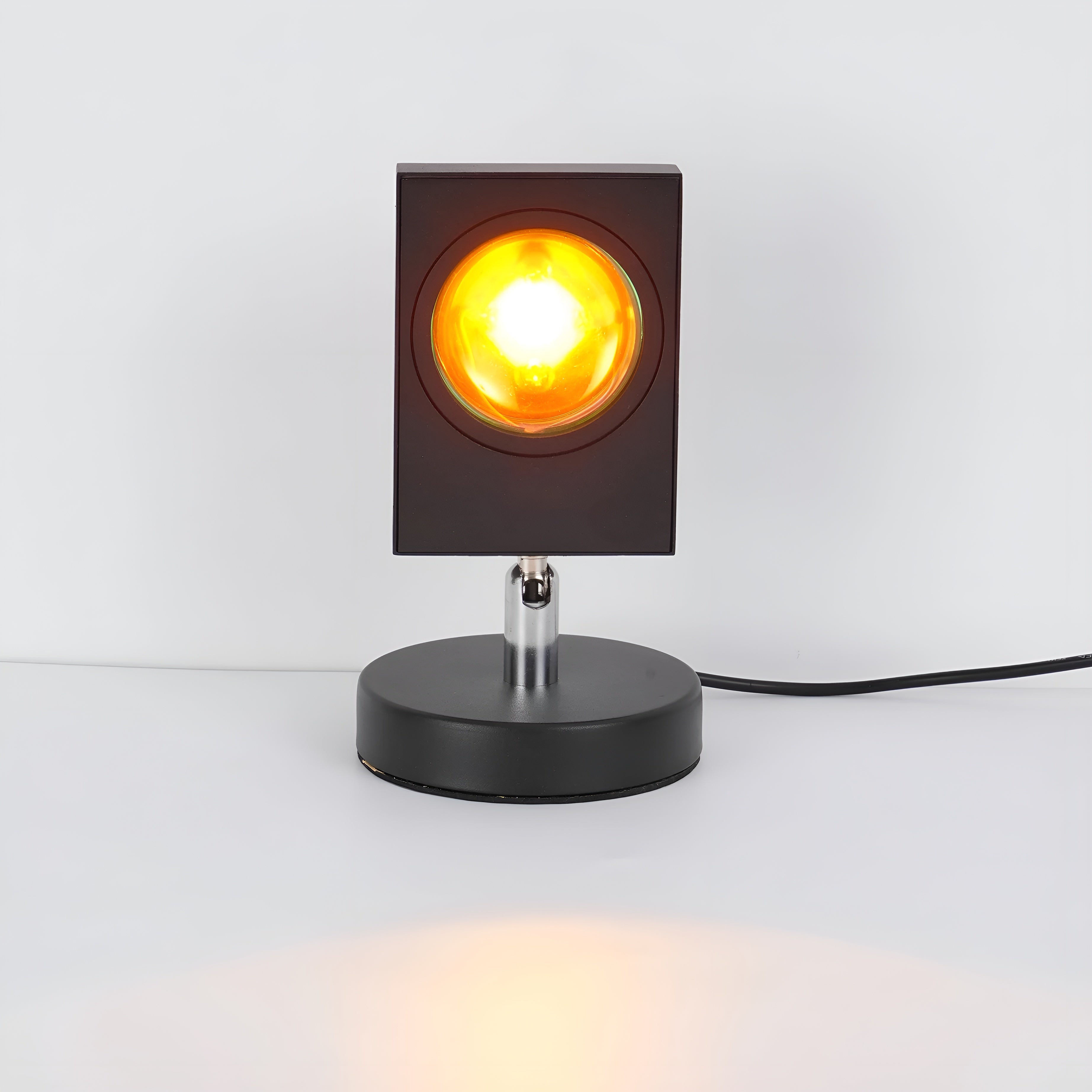 Solunor – Stemningsbordlampe med halo lys i solnedgangsfarver