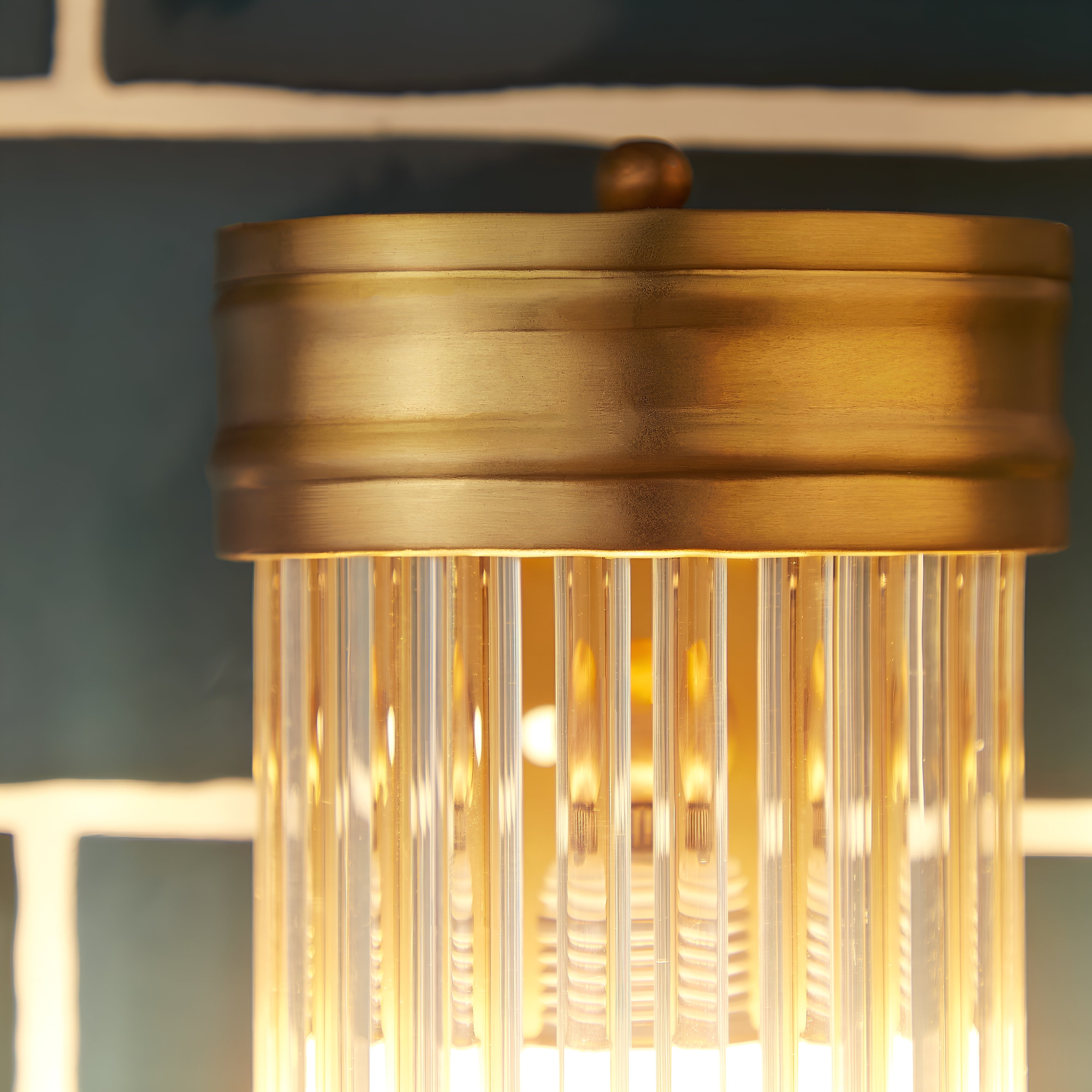NordAura – Art Deco væglampe i antik messing med glasstænger